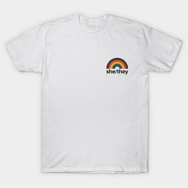 She/They Pronouns Rainbow T-Shirt by lavenderhearts